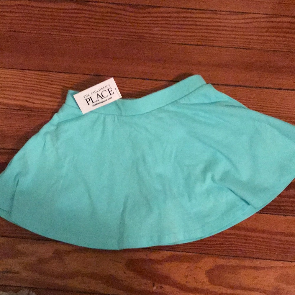 NWT turquoise skirt with attached shorts